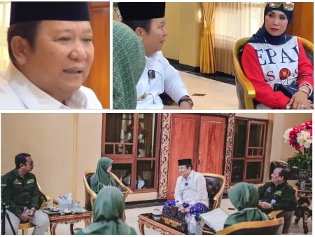 Bupati Jember Hendy Siswanto dan Istri saat menerima petugas BPS.jpg
